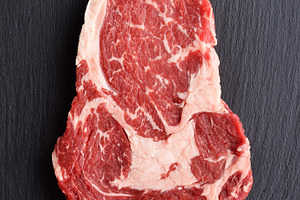 Fresh raw rib eye beef steak featuring beef, prime, and black angus
