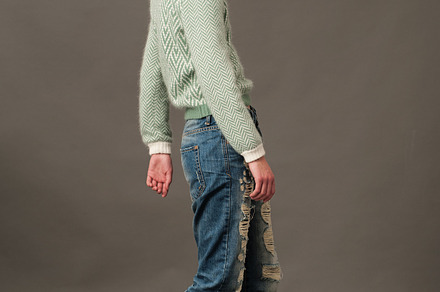 Fashion model pose in blue jeans and woolly sweater containing luxury, a Beauty & Fashion Photo by Serovphoto