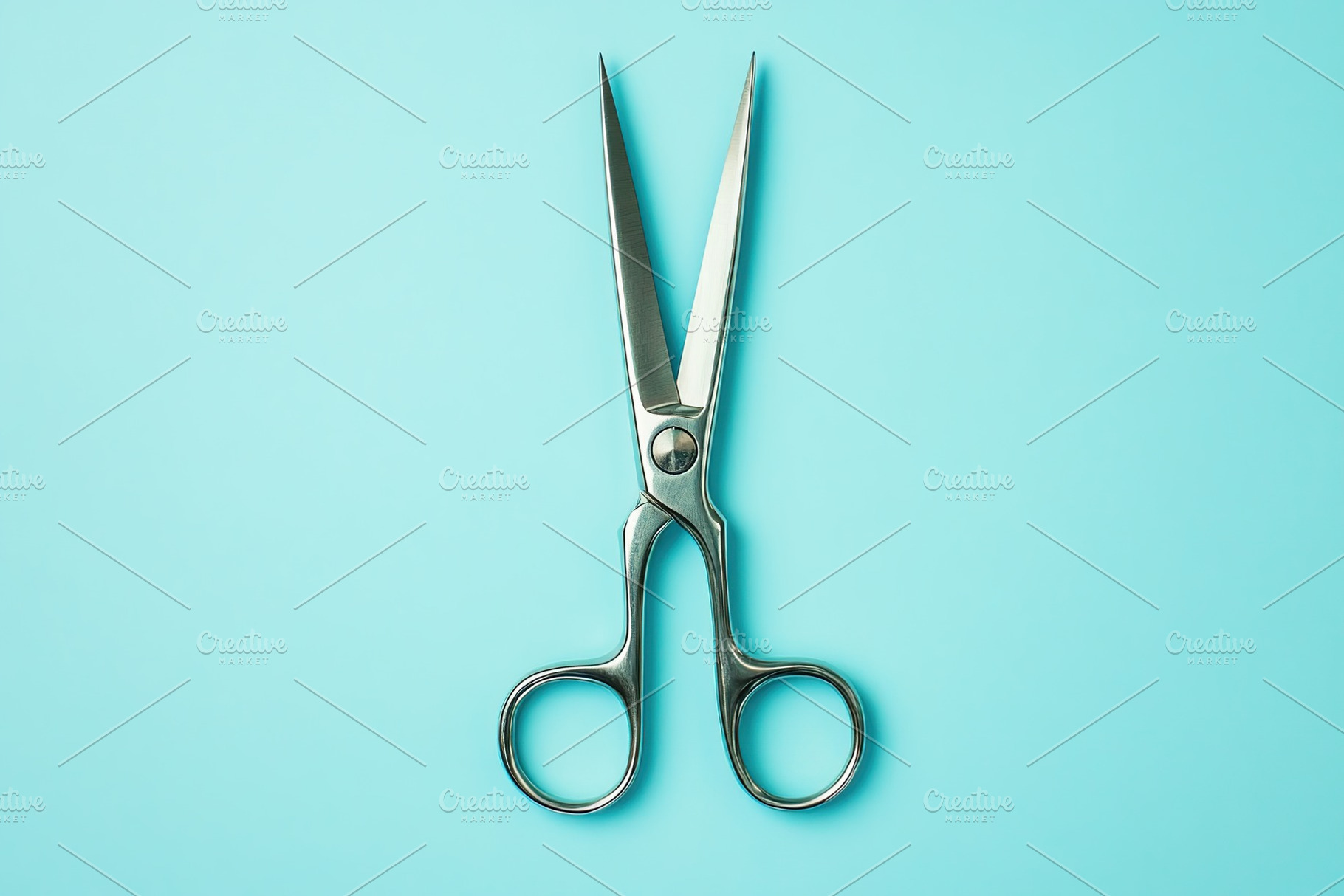Sterile surgical scissors on blue background, a Health & Medical Photo by AlyaAnd