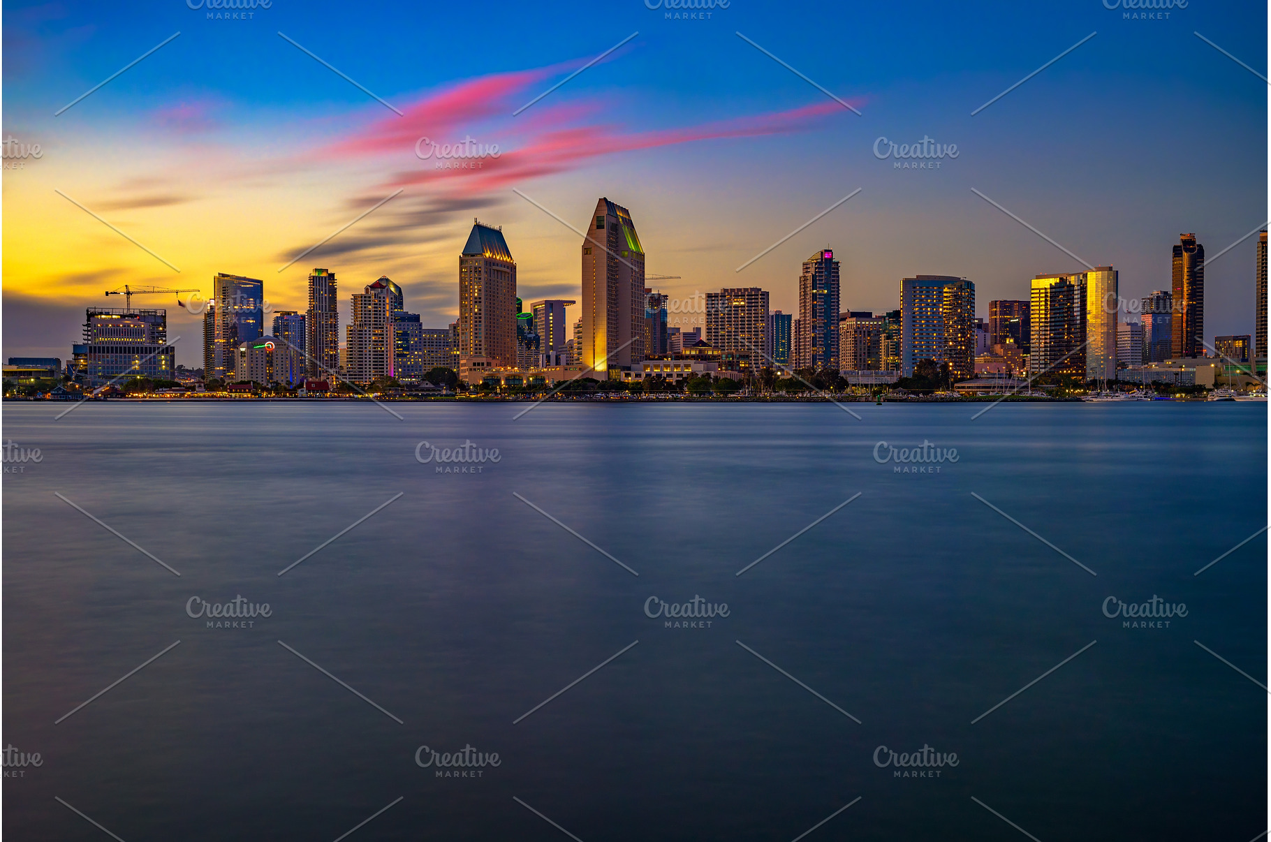 Sunset over San Diego skyline in, an Architecture Photo by Nick Fox