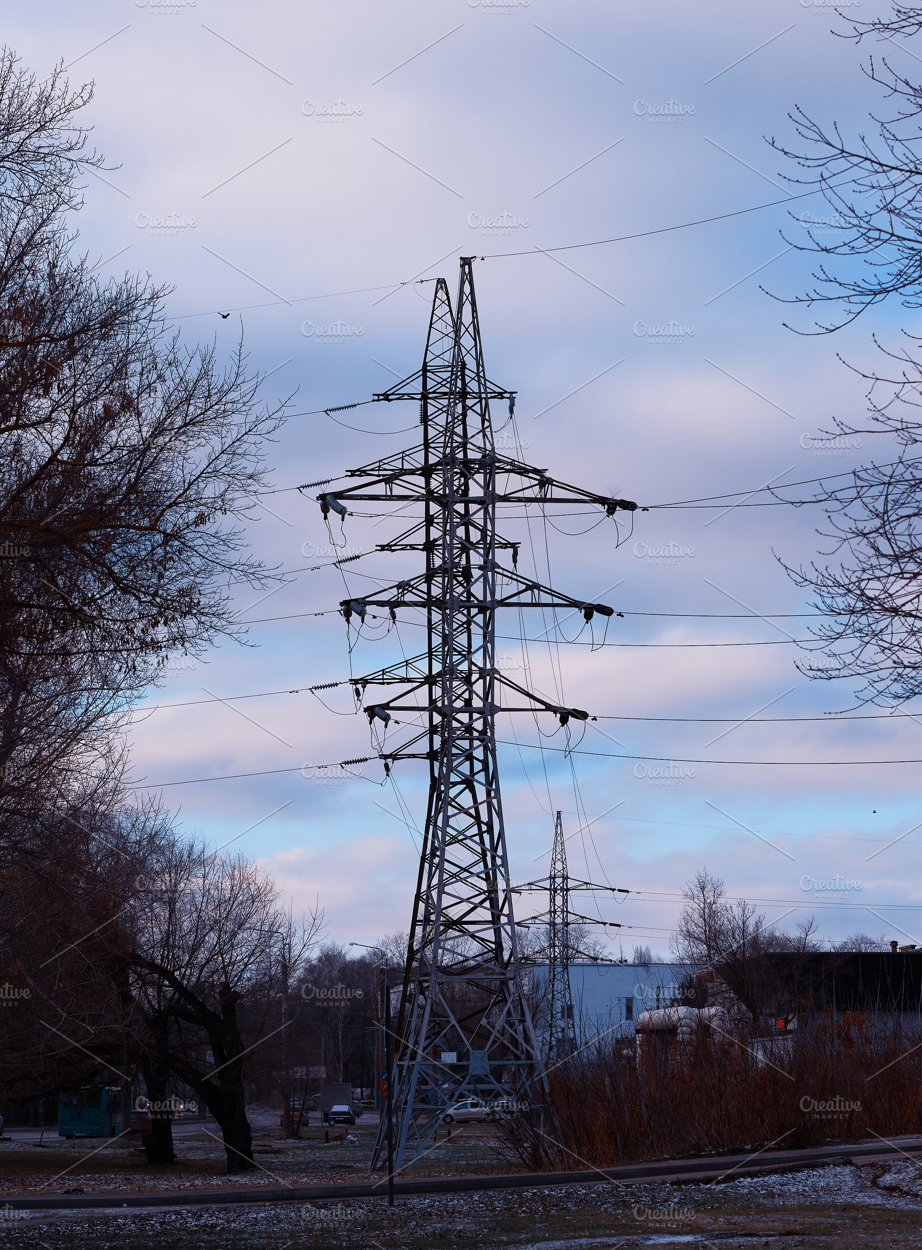 Power line in industrial city background, an Industrial Photo by RETROWAVE '88