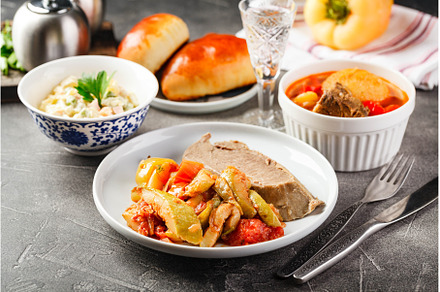 Dinner table with different dishes, a Food & Drink Photo by Irina Burakova