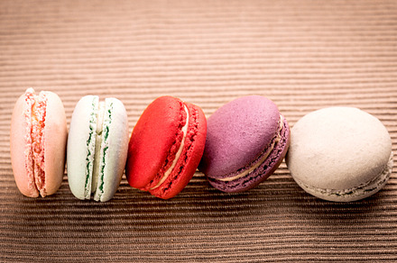 Macaron background containing assorted, assortment, and background, a Food & Drink Photo by Looker_Studio