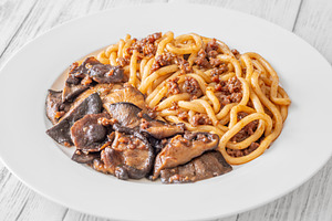 Unagi udon noodles served with beef, a Food & Drink Photo by Alexander Prokopenko
