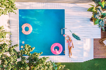 Top view young woman in swimsuit swi stock photo containing top and view, a Holiday Photo by Maksym Zaitsev