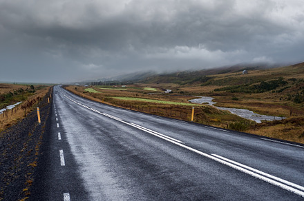 Highway road and mountain view during auto trip in Iceland. Spec, a Nature Photo by YuriyB
