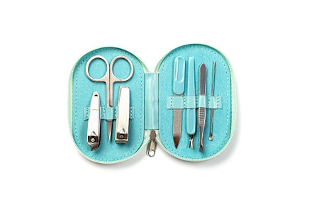 Manicure or pedicure equipment in blue travel bag, spa set isolated on white, h, a Beauty & Fashion Photo by iuliia_n
