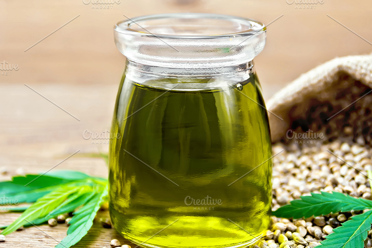 Oil hemp in jar with sheet containing hemp, cannabis, and grain, a Food & Drink Photo by rezkrr (Photo 2 of 2)