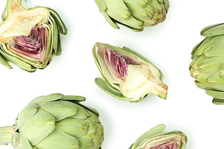 Fresh raw artichoke isolated on white background, a Food & Drink Photo by AtlasStudio PRO