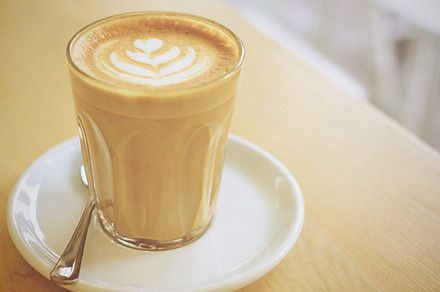 Cup of latte or cappuccino coffee containing drink, coffee, and hot, a Food & Drink Photo by Nuchylee Photo