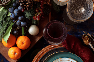 Elegant holiday dining table setting for a festive winter celebration, featurin, a Food & Drink Photo by Studio ANNA