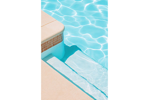 Sunlit swimming pool steps with, a Nature Photo by Lermont51