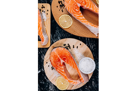 Salmon fish steak on a black, a Food & Drink Photo by darksoul72