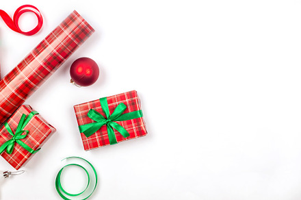 Christmas composition. Red gift boxes with green ribbon at white, a Holiday Photo by vimart
