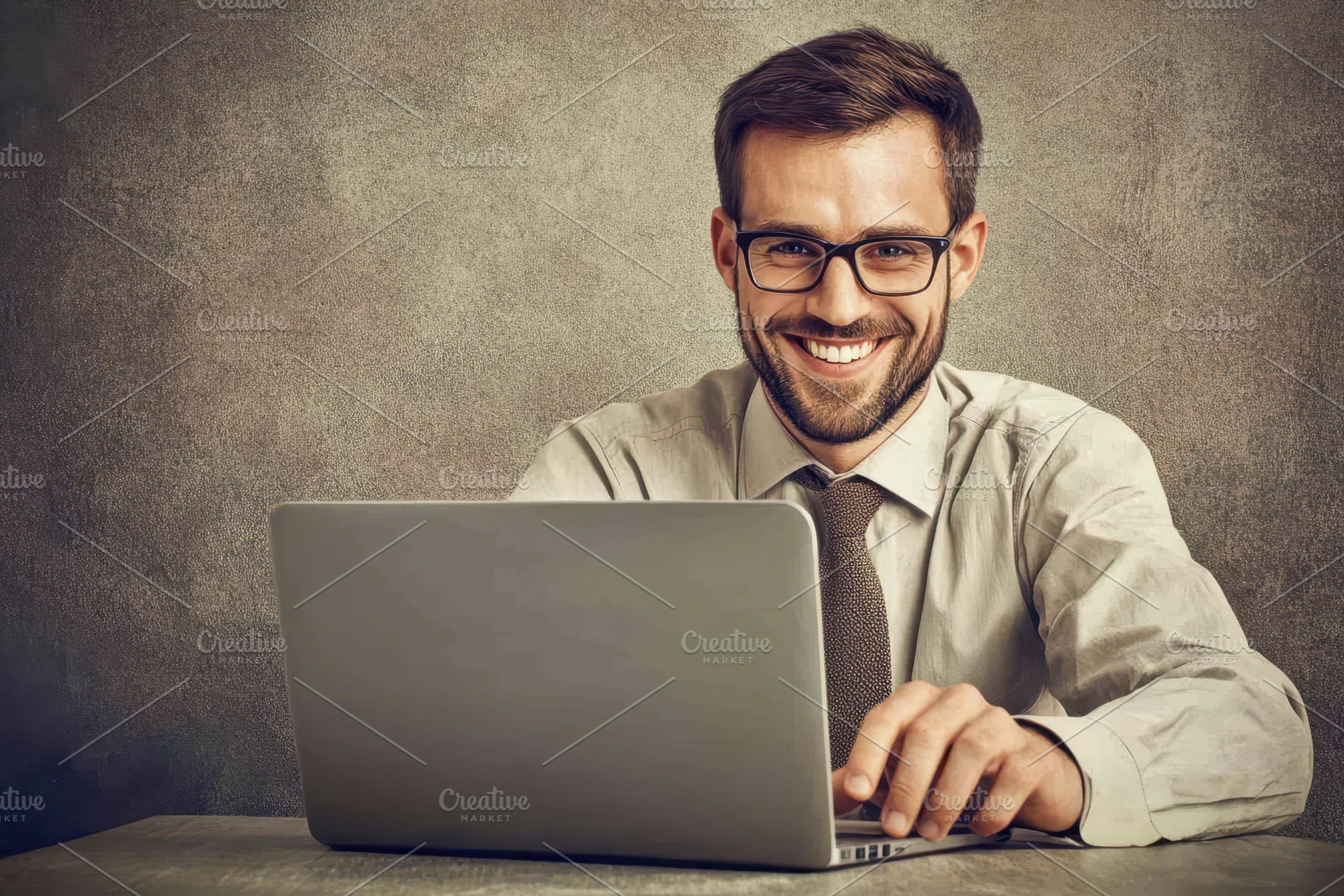 Professional man working on laptop w, a Photo by Tanuart
