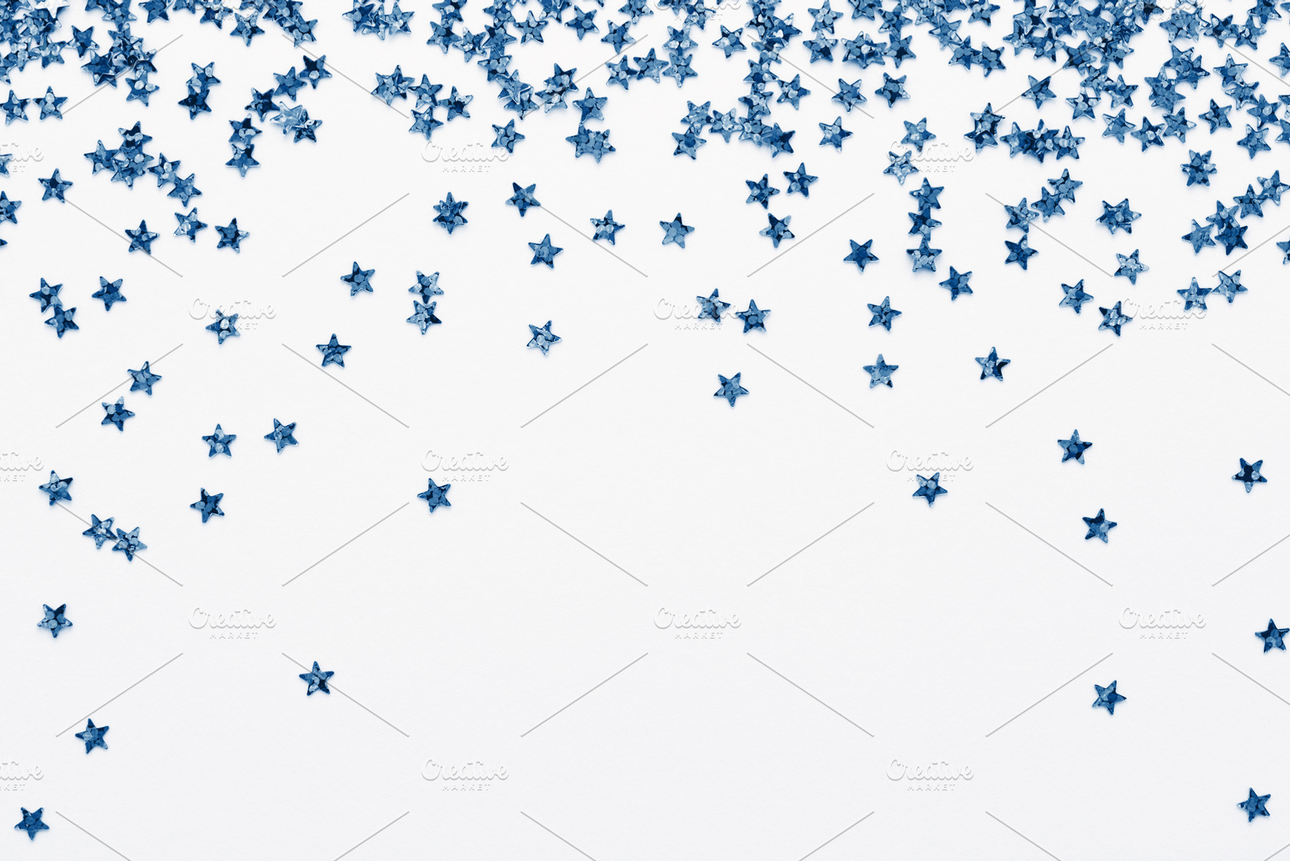 Classic Blue stars confetti on white, a Holiday Photo by Julia Manga