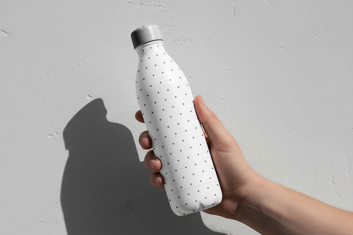 Hand Holding Water Bottle Mockup, a Cups & Container Mockup by Templeste (Photo 2 of 3)