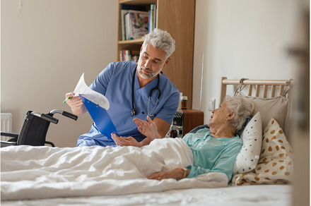 Caregiver doing regular check-up of, a Health & Medical Photo by HalfPoint