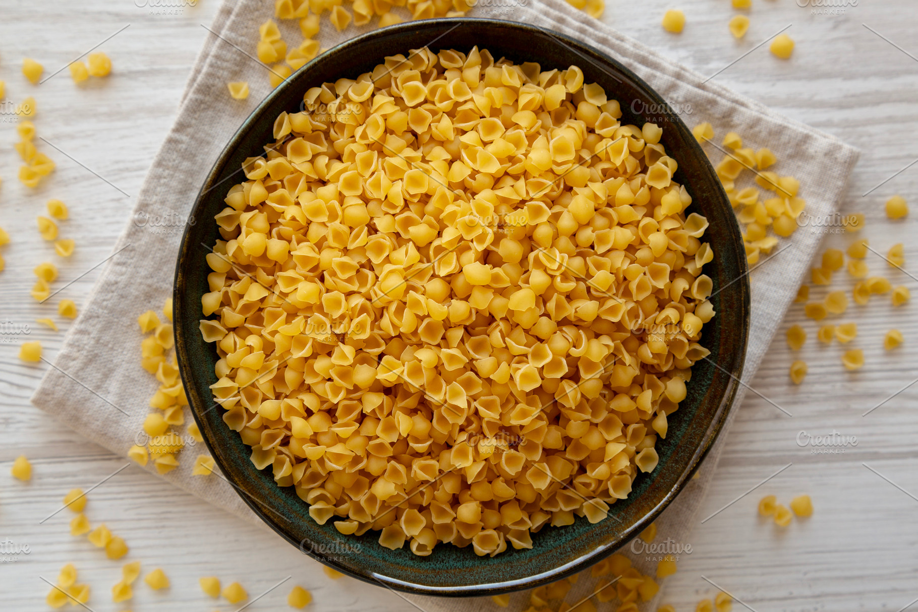 Homemade Perlini Pasta in a Bowl, top view. Flat lay, overhead,, a Food & Drink Photo by LiudmylaChuhunova