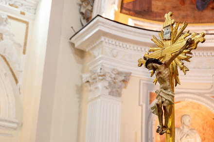 Golden crucifix inside a church representing jesus christ on the cross, an Abstract Photo by Antonio Gravante Market
