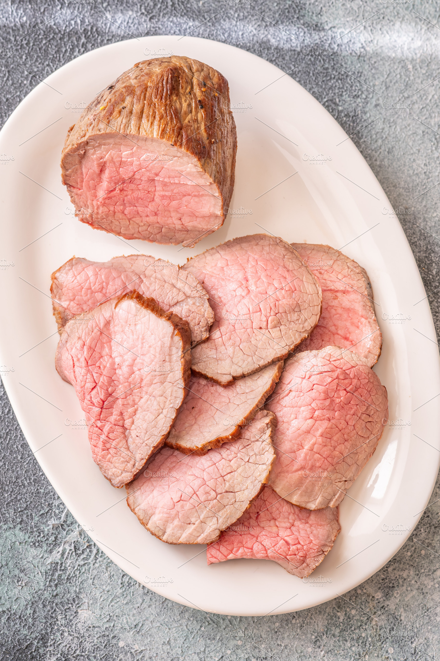 Perfectly sliced roast beef, a Food & Drink Photo by Alexander Prokopenko