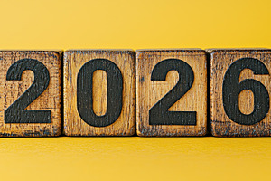 Rustic wooden blocks with bold black 2026 numbers on vibrant yel, a Background Photo by José Manuel Gelpi