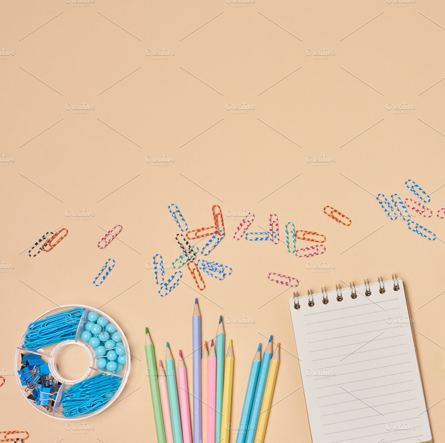 Flat lay of colorful school and office supplies including pencil, a School & Education Photo by ndanko