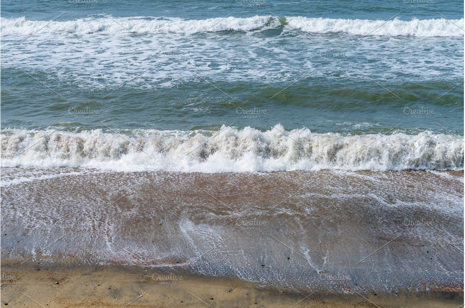 Frozen motion of waves crashing onto, a Nature Photo by Backyard Stock