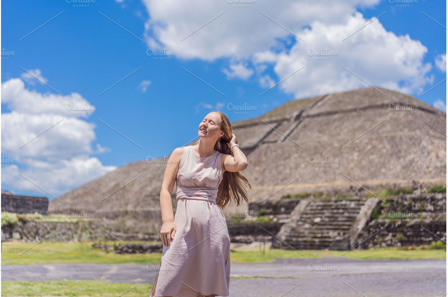 Female tourist standing in front of, a Person Photo by Elizaveta Galitskaya