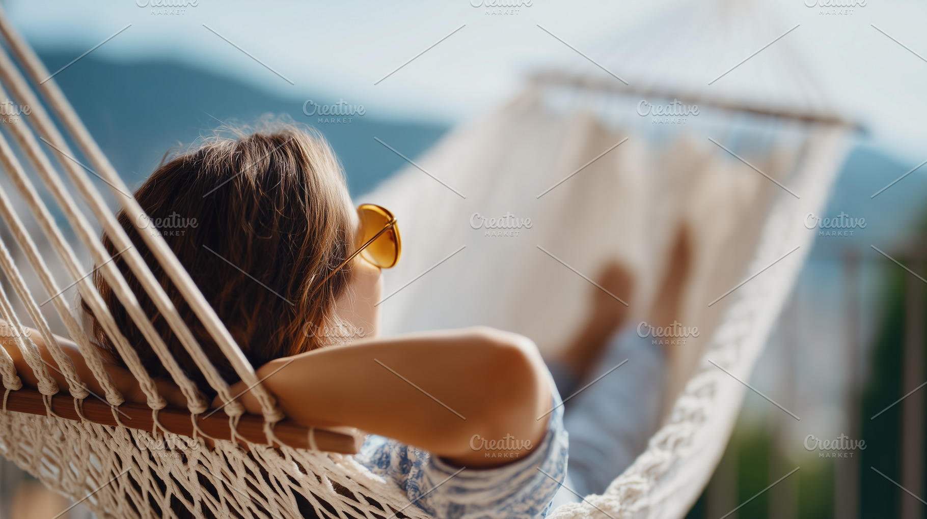 Woman relaxes in a hammock, a Person Photo by MistyDay