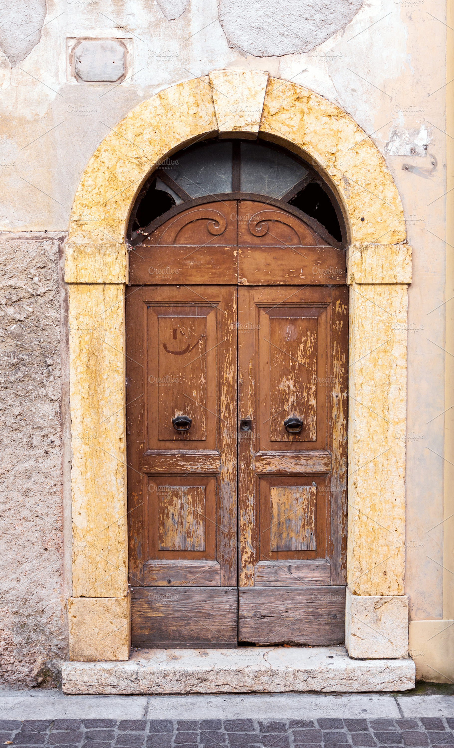 Weathered wooden doors in Italy, an Architecture Photo by BOOCYS