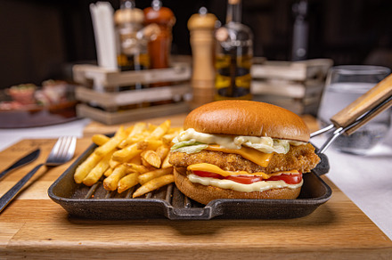 Tasty hamburger with breaded chicken