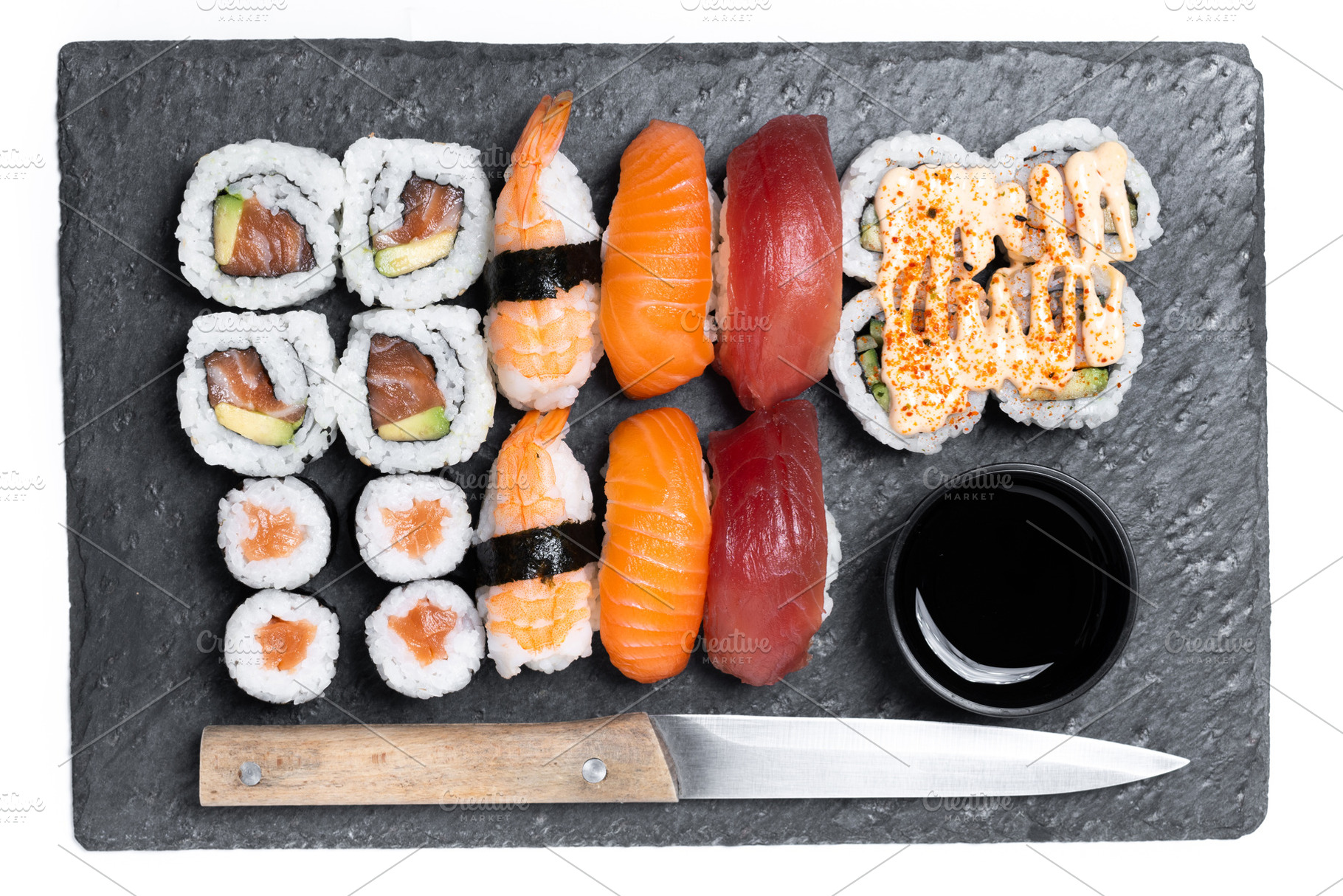 Assorted sushi platter with nigiri and maki rolls, a Food & Drink Photo by etorres69