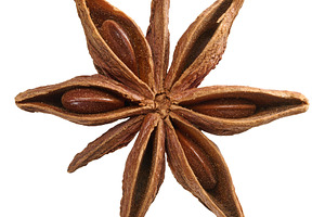 Spice star anise on white isolated background, top view, a Food & Drink Photo by ndanko