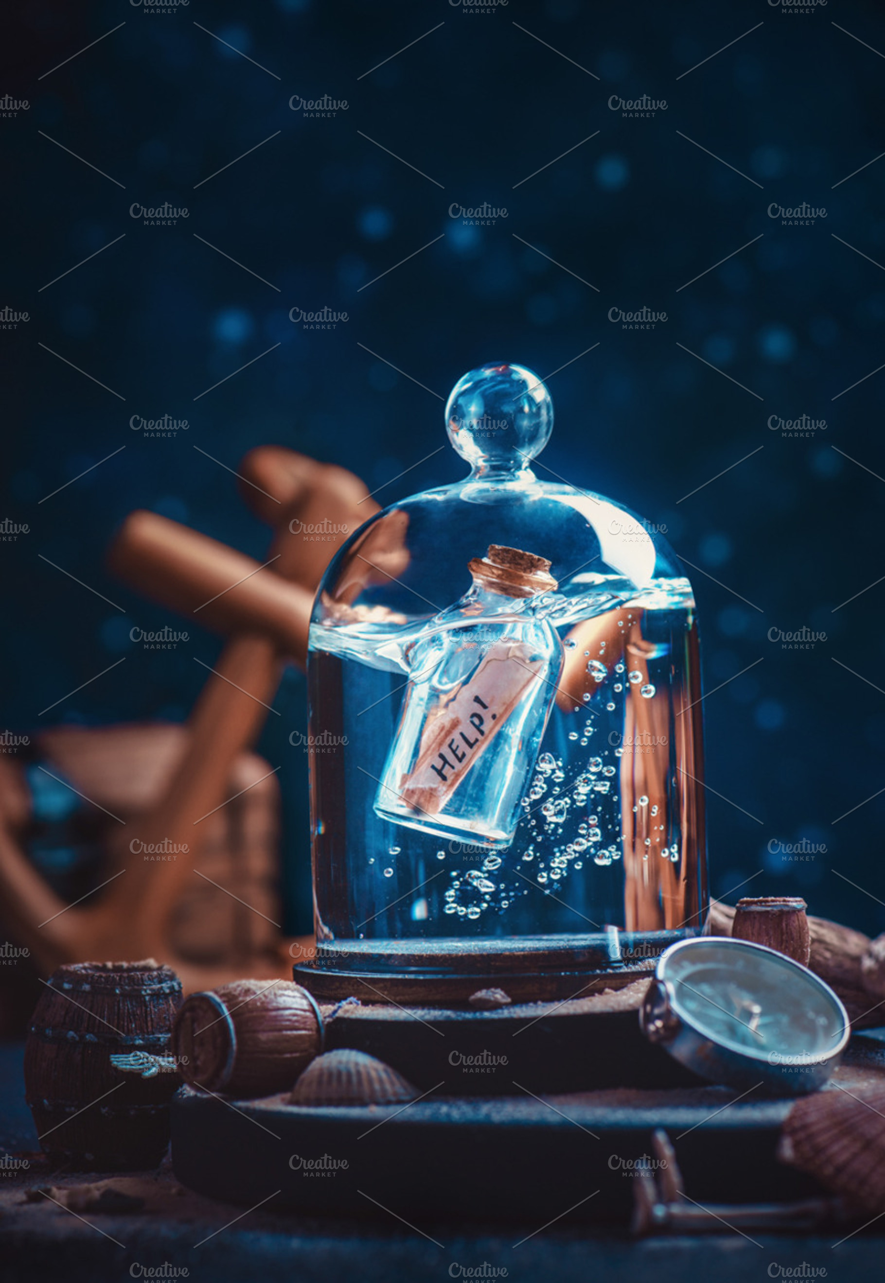 Help written in a message in a bottl, a Background Photo by dinabelenko
