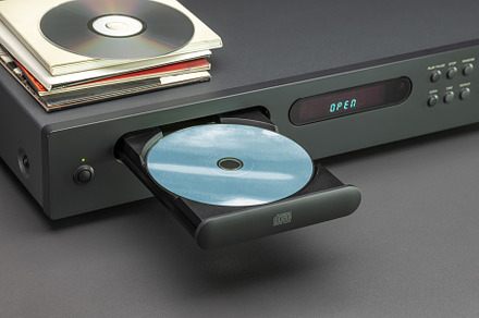 CD player with open tray, close up.