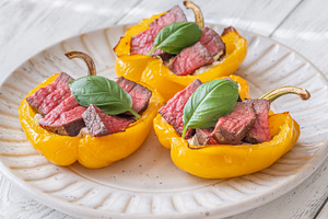 Roasted Yellow Bell Peppers Stuffed With Cream Cheese And Juicy, a Food & Drink Photo by Alexander Prokopenko