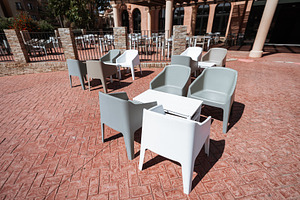 Modern empty outdoor patio seating, a Food & Drink Photo by SkyNext
