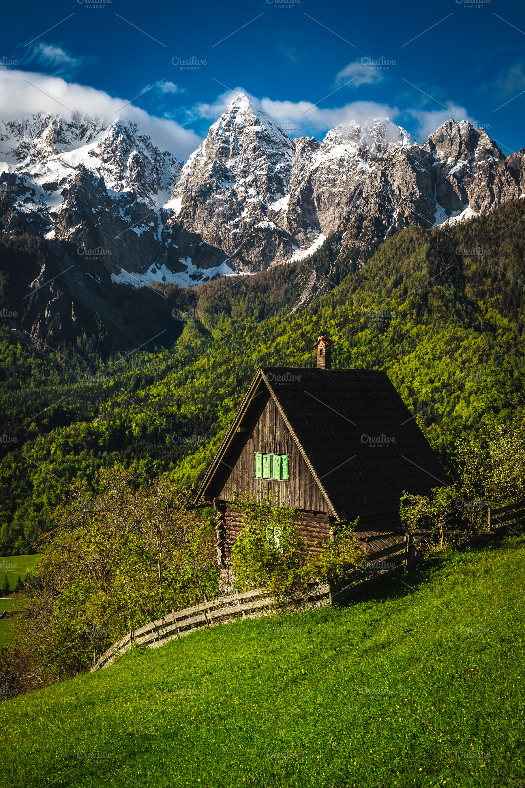 Lonely cute wooden hut on the slope, an Architecture Photo by Alpine Dreams