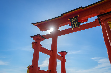 Close-up view of the famous Itsukushima shrine red torii gate in