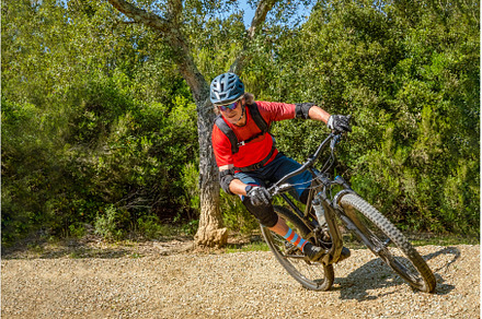 Mountain biker takes a turn at an, a Sports & Recreation Photo by reisegraf.ch