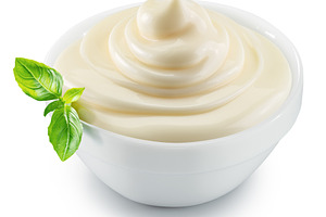 Homemade mayonnaise in a white bowl on white background. File co, a Food & Drink Photo by Volff