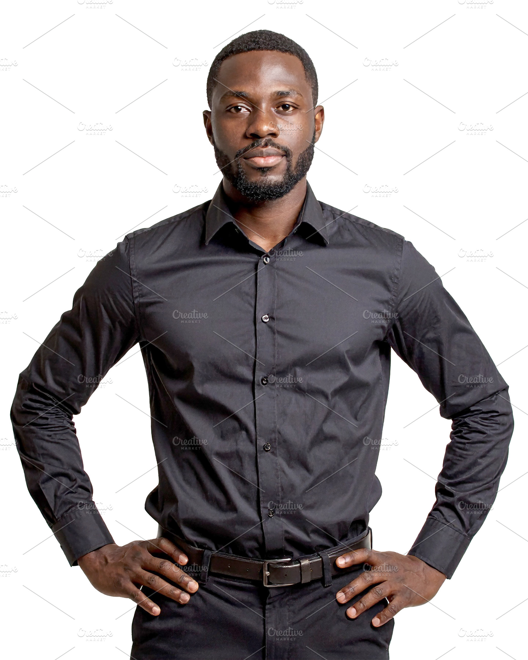 Black man standing in front of a neutral backdrop wearing a bold, a Person Photo by DanFLCreativo