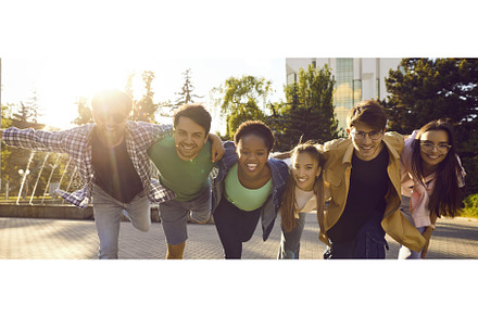 Group of cheerful young, a Person Photo by StudioRomantic