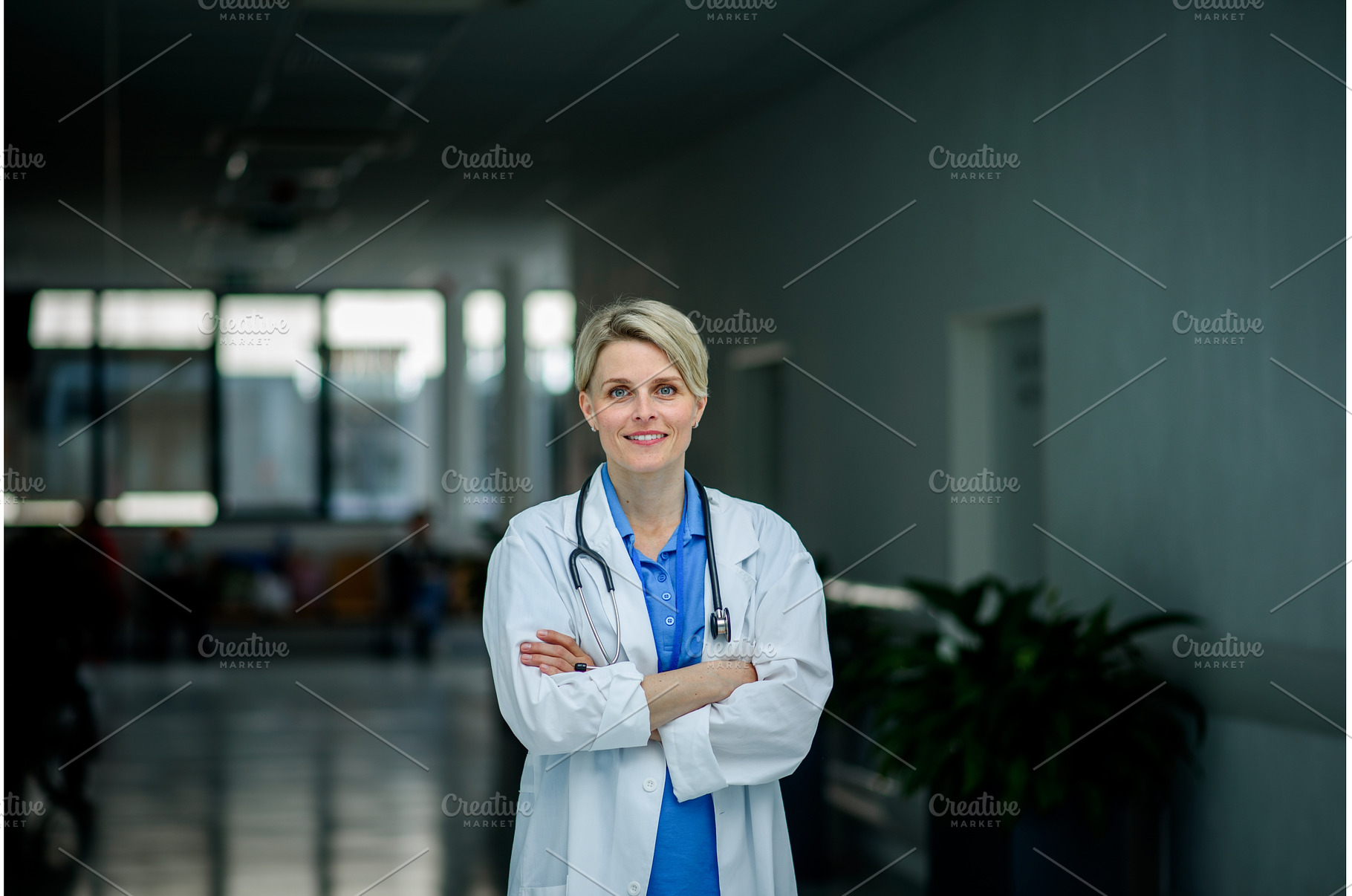 Young female doctor with short hair, a Person Photo by HalfPoint