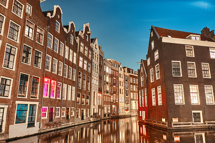 Buildings at night in Amsterdam