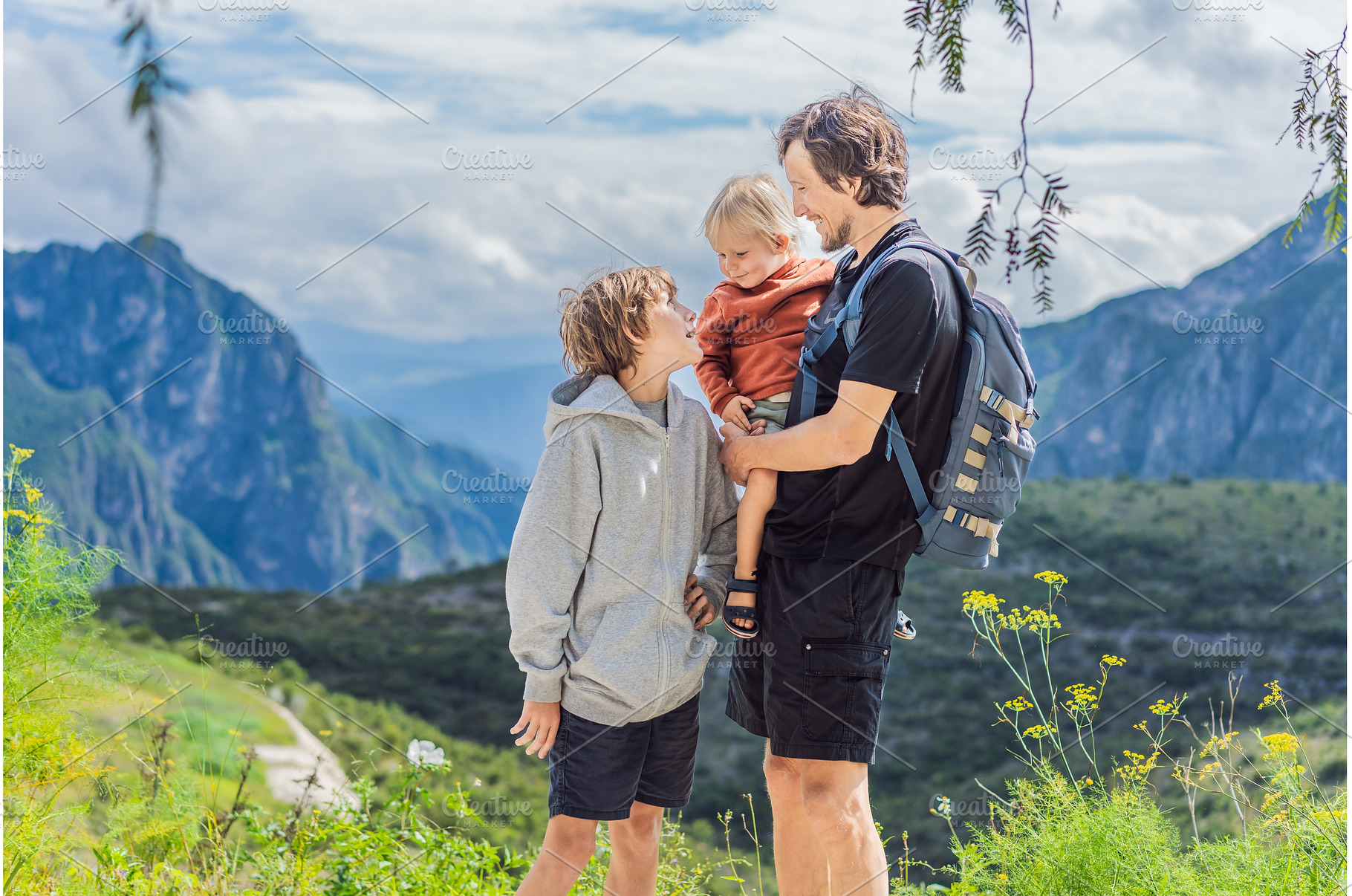 Father with his two sons standing in, a Nature Photo by Elizaveta Galitskaya