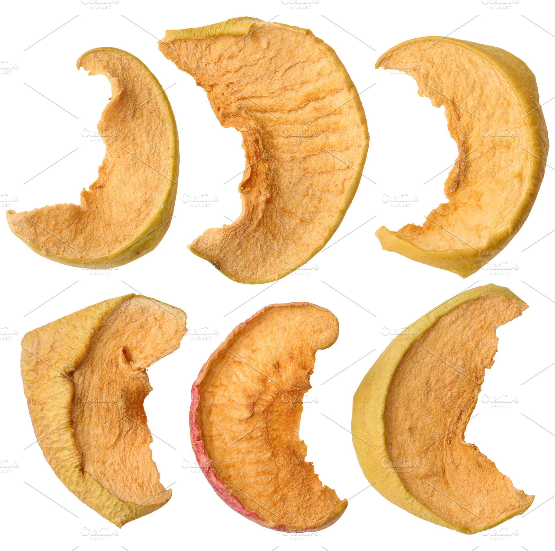 Dried apple slices on isolated background, a Food & Drink Photo by ndanko