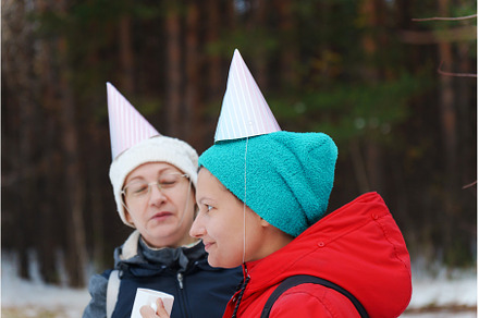 Friends savor the joy of winter in a