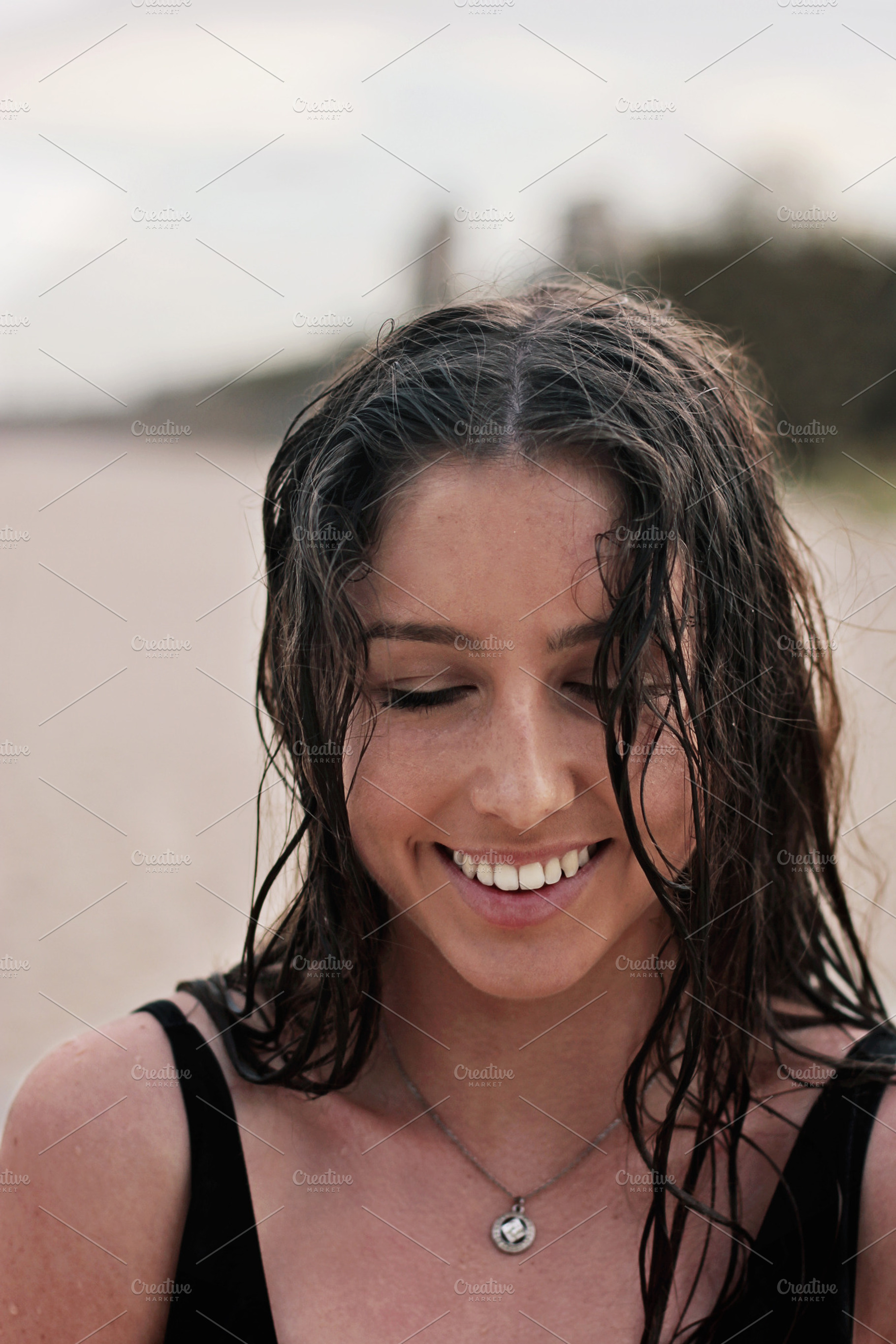 Smiling girl at the beach in Summer, a Person Photo by Chris Joel Campbell